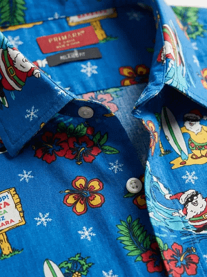 Primark Santa Surf Shirt closeup fold on Preloved Make I Shop website.